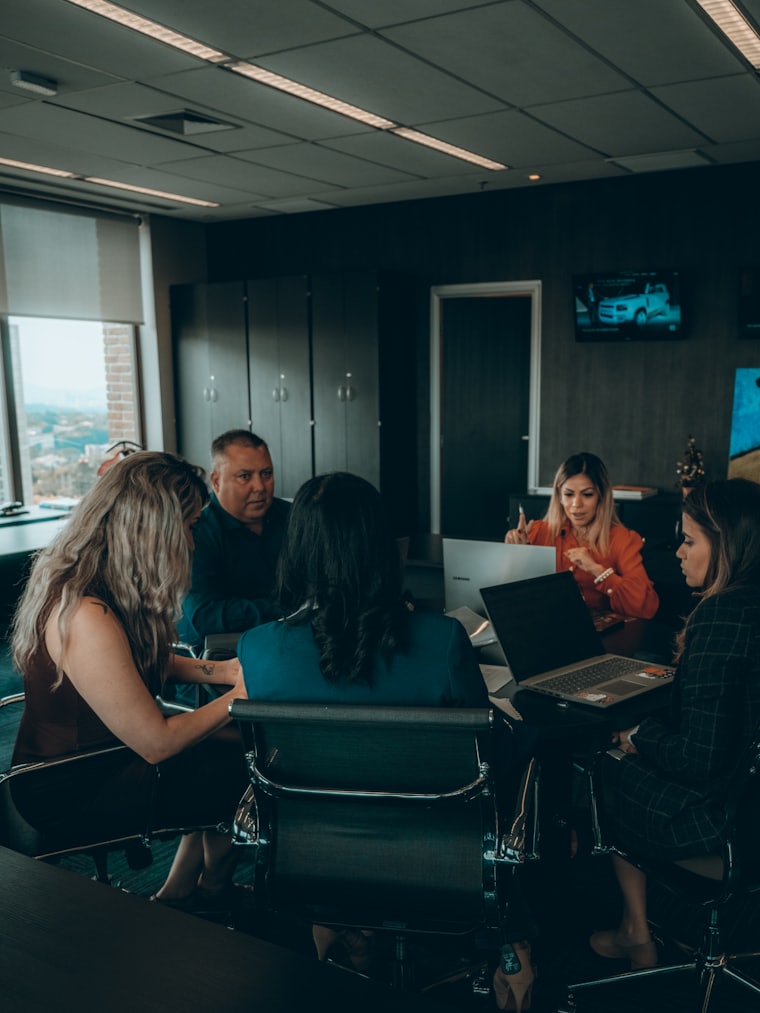 Complete Venture Group team in a working session